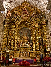 Retablo mayor de la iglesia del Hospital de la Caridad (Sevilla), de traza de Bernardo Simón de Pineda, tallas de Pedro Roldán, dorado y policromía de Valdés Leal (1670-1675).