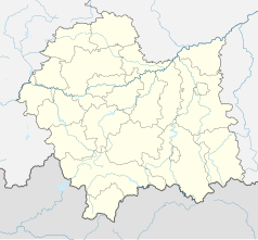 Mapa konturowa województwa małopolskiego, blisko centrum na lewo u góry znajduje się punkt z opisem „Tyniecki cmentarz parafialny”
