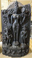 Pala basalt statue of Lalita flanked by Gaṇeśa and Kārttikeya, 11th century