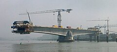 The Pierre Pflimlin Bridge is a balanced cantilever made of concrete, shown here under construction.