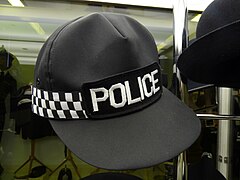 A typical British police baseball cap on display at the West Midlands Police Museum in Sparkhill Police Station, Birmingham, England.