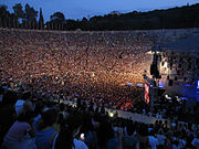 Contemporary audience in ancient outdoor stadium (Greece, 2009)