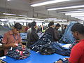 The final steps of preparing jeans for market