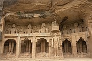 Jainism-related cave monuments and statues carved into the rock face inside Siddhachal Caves, Gwalior Fort