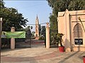 A sign at the gate of Malkhan Singh Memorial Garden in Aligarh inviting to the annual homage event celebrating the freedom fighter's contributions to India's independence movement