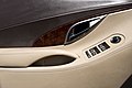 Door panel in 2nd generation Buick LaCrosse with faux leather door cover.