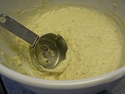 The dough is relatively wet, and cannot be shaped as a bread dough could be.