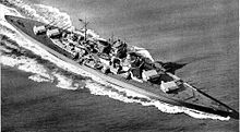 A black and white artwork depicting a warship with four large twin-gun turrets