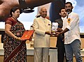 Shri Ram Nath Kovind presenting the Swarna Kamal Award to Nagraj Manjule