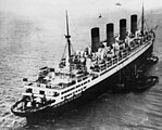 RMS Aquitania grounded hard on Thorne Knoll near Southampton, April 1935.