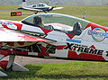 The low drag canopy of an Extra 300 aerobatic light aircraft.