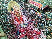 Procession of the famous “Lalbaug cha Raja” Ganesha idol during the Ganesh Chaturthi festival in Mumbai, Maharashtra