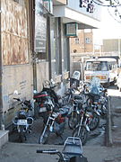 Sidewalk blocked with motorcycles in Iran