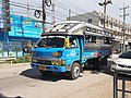 Image 4Medium-sized Isuzu Songthaew (truck bus) as seen in Samut Sakhon, Thailand. (from Combination bus)