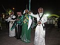 Image 18Saudi males dressed and prepared for ardah, the national dance. It also includes swords, poetry, and singing. (from Culture of Saudi Arabia)