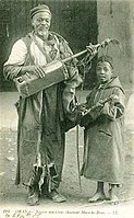 Oran, Algeria, early 20th century. The Geumbri is also an instrument of Morocco, used in Gnawa ceremonies.