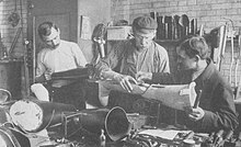 B&W photo of a workshop creating artificial limbs