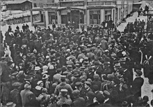 B&W picture of a crowd outside
