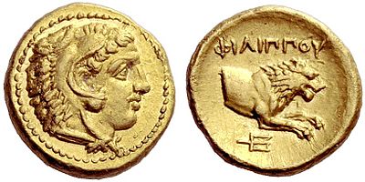 Two sides of a gold coin, with the obverse (left) showing a profile of Philip II wearing a lion skin, and the reverse (right) depicting a lion's forepart.