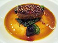 Foie gras with mustard seeds and green onions in duck jus