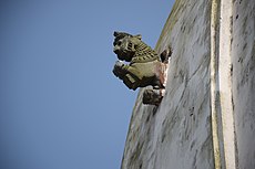 Jumping lion on the temple wall
