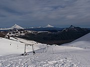 Ski slopes on the Antillanca Group, in the background: Puntiagudo and Osorno