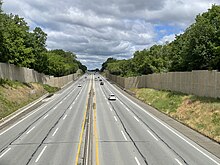 Straight, lightly-traveled section of six-lane highway