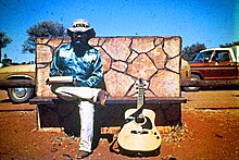 Isaac Yama outside Ininti Store, Uluru, NT, Australia. 1983