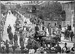 Funeral procession through Epsom with the streets lined with mourners