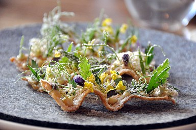 Toast with turbot roe, herbs and vinegar dust