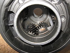 One of three sets of three gears inside the planet carrier of a Ford FMX Ravigneaux transmission