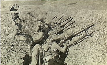 Indian troops prepare to fire against enemy aircraft with Lewis guns.