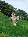 Кам'яний хрест на території скиту