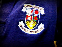 Coat of arms of the school on a student's uniform