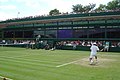 Image 24Sébastien Grosjean takes a shot on Court 18 during the 2004 Championships. (from Wimbledon Championships)