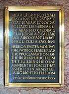 Plaque commemorating the Easter Rising at the General Post Office, Dublin, with the Irish text in Gaelic script, and the English text in regular Latin script