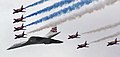 Image 75Concorde (and the Red Arrows with their trail of red, white and blue smoke) mark the Queen's Golden Jubilee. With its slender delta wings Concorde won the public vote for best British design. (from Culture of the United Kingdom)