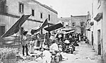 A street market in Mexico City, 1884–1885.