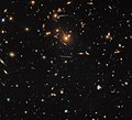 Warped and distorted around SDSS J1050+0017.[52]