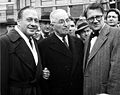 Jack Benny, former U.S. President Harry Truman, and Hans Schweiger in overcoats, 1958.