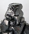 Image 25Galena, PbS, is a mineral with a high specific gravity. (from Mineral)
