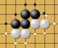 Image 4One black chain and two white chains, with their liberties marked with dots. Liberties are shared among all stones of a chain and can be counted. Here the black group has 5 liberties, while the two white chains have 4 liberties each. (from Go (game))