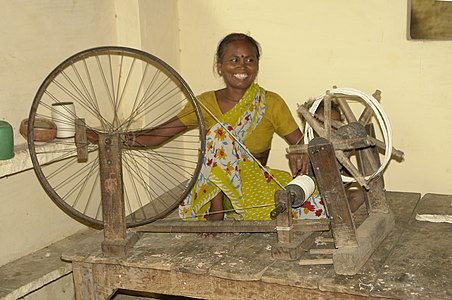 Using a bicycle-wheel charkha (and a yarn swift)