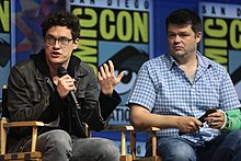 A photograph of Lord and Miller speaking at the 2018 San Diego Comic-Con International