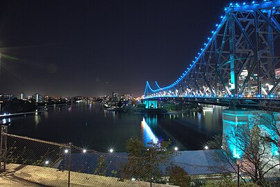 The Story Bridge in Brisbane, Australia illuminated in blue light for ovarian cancer awareness.