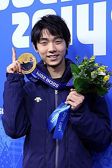 Figure skater Yuzuru Hanyu with the gold medal at the 2014 Winter Olympics