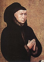 Painting detail of a man in black with hands folded in prayer