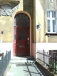 Door with transom light.