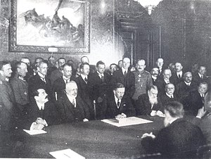 Picture taken at the signing of the treaty (Bulgarian State Archives). Bulgarian Prime Minister Vasil Radoslavov is fourth from the left, sitting.