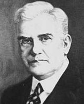 portrait of white-haired man